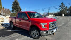 Front passenger side of outside of Ford F150 for sale, bid