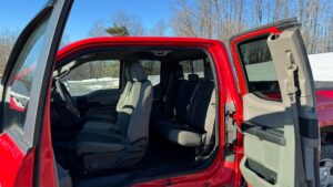 Both doors open picture of inside of Ford F150 for bid, sale
